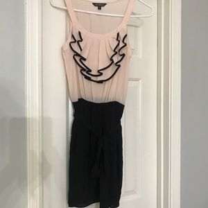 Pink and black ruffle dress with pockets and tie